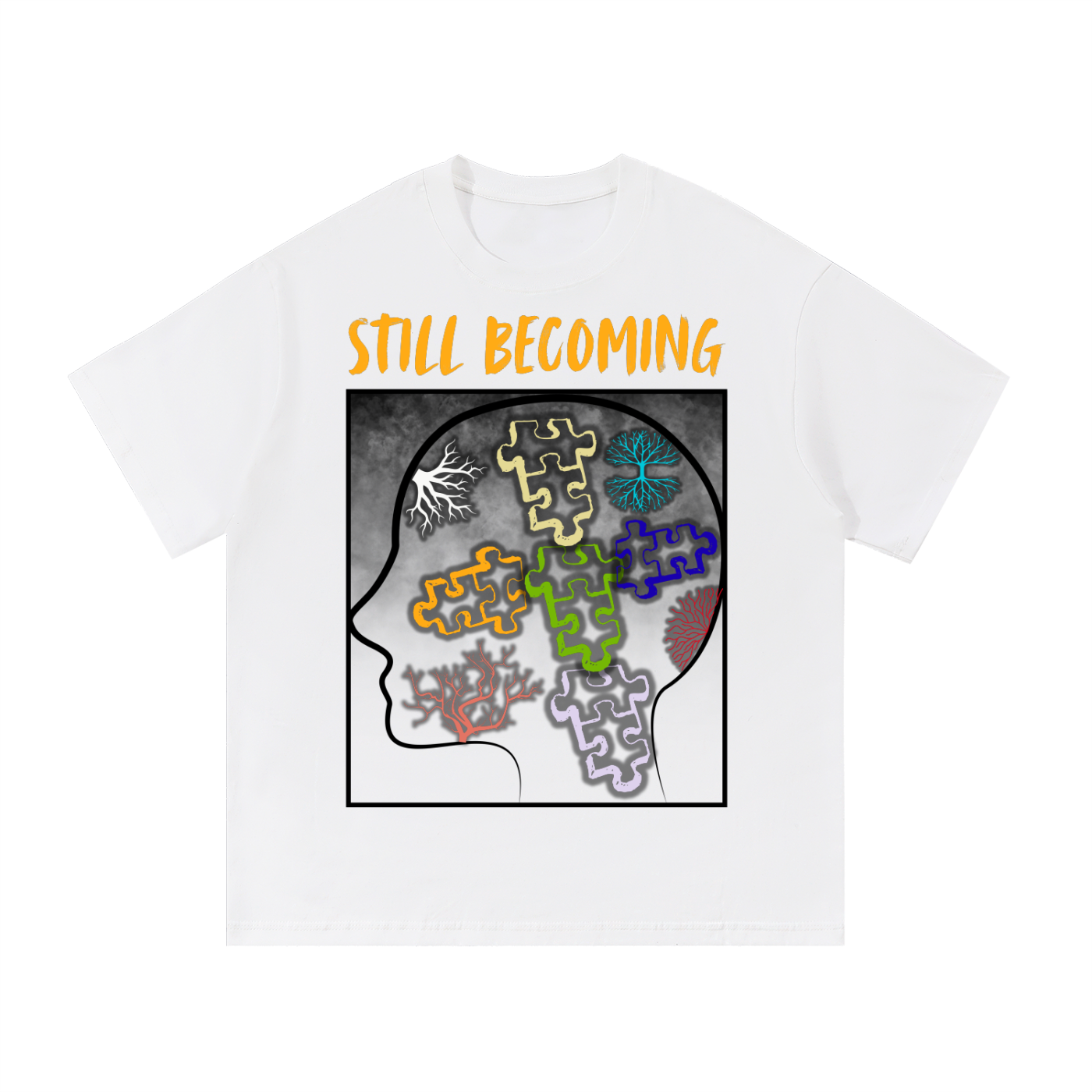White t-shirt with colorful puzzle pieces inside a silhouette of a head and 'STILL BECOMING' text.